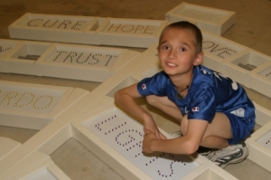 Brandon helping with the Christmas Word Tree